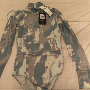 Brand new long sleeve rashguard swim suit with tags.